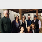 Dr. Milmon Harrison (standing far right) with his colleagues in the 2019-20 Community Engaged Learning Faculty Fellows program. 